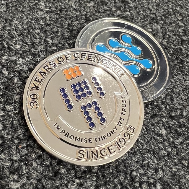 Photograph of the CFEngine 30 year anniversary coin.